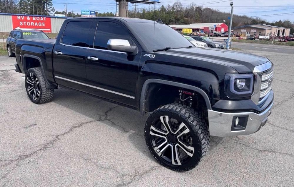 Client's lifted black GMC Sierra Z71 pickup